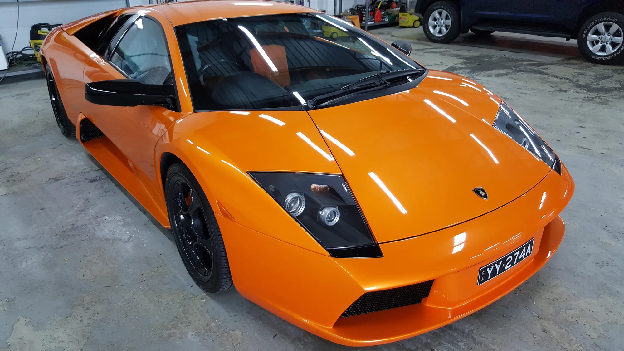 Orange Lamborghini Murcielago inside the Ceramicar workshop in Windsor Gardens Adelaide
