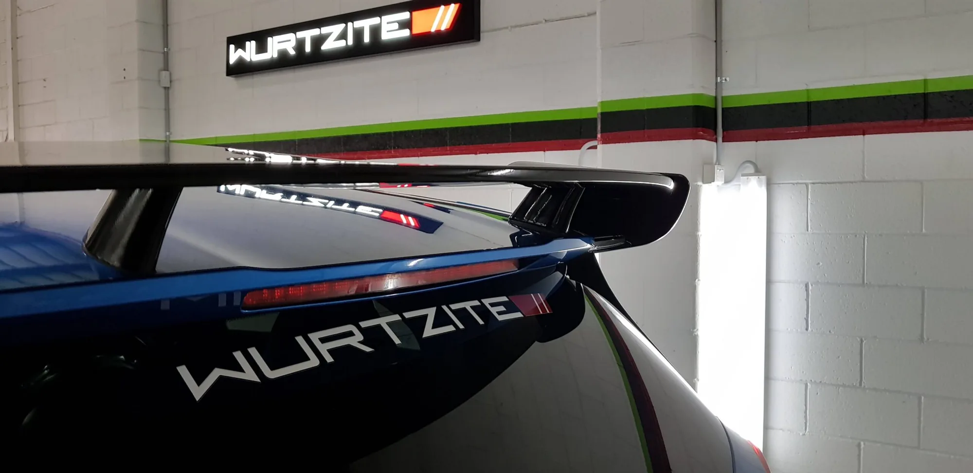 Wurtzite certified installer signage on the wall of the Ceramicar workshop in Windsor Gardens Adelaide